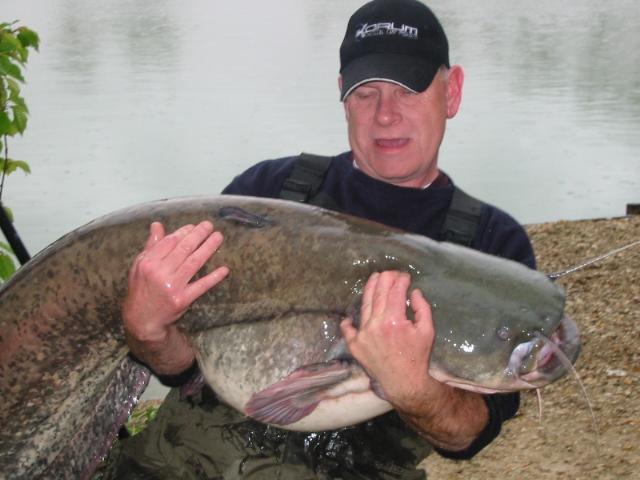 Mac struggling with the slime-ball of a huge 85 pound PUSSY!