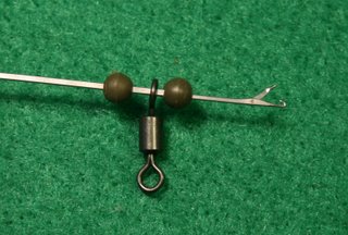 How to push beads on leeders to use as shocker buffer when rig settles or during casting