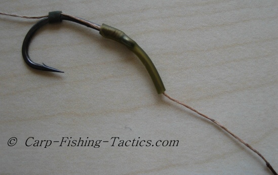 Hook link fishing rig with supple section around 2 inches long