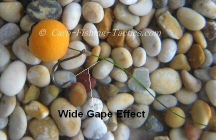 Overhead view of simple spinning hook rig on gravel- notice the wide gape effect from line to point?